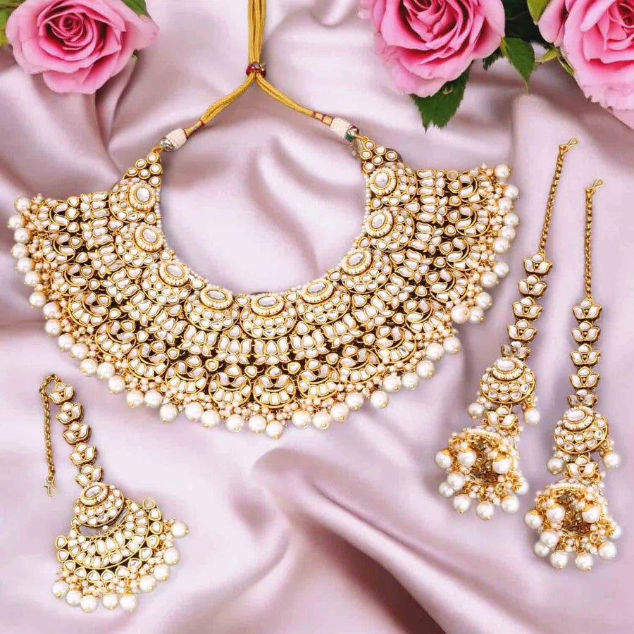 Taksh creation Gold - plated kundan Bridal jewellery set