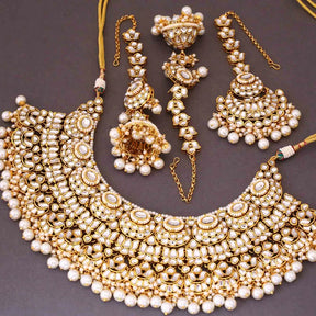 Taksh creation Gold - plated kundan Bridal jewellery set