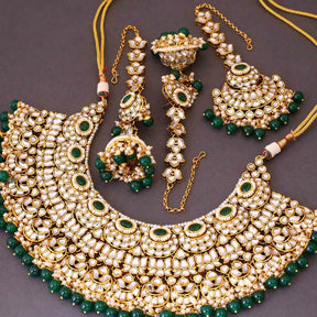 Taksh creation Gold - plated kundan Bridal jewellery set