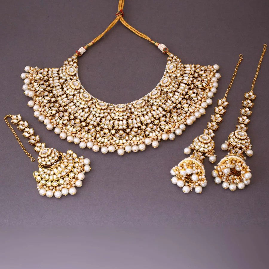 Taksh creation Gold - plated kundan Bridal jewellery set