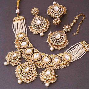 Taksh Creation Gold- plated kundan bridal jewellery set