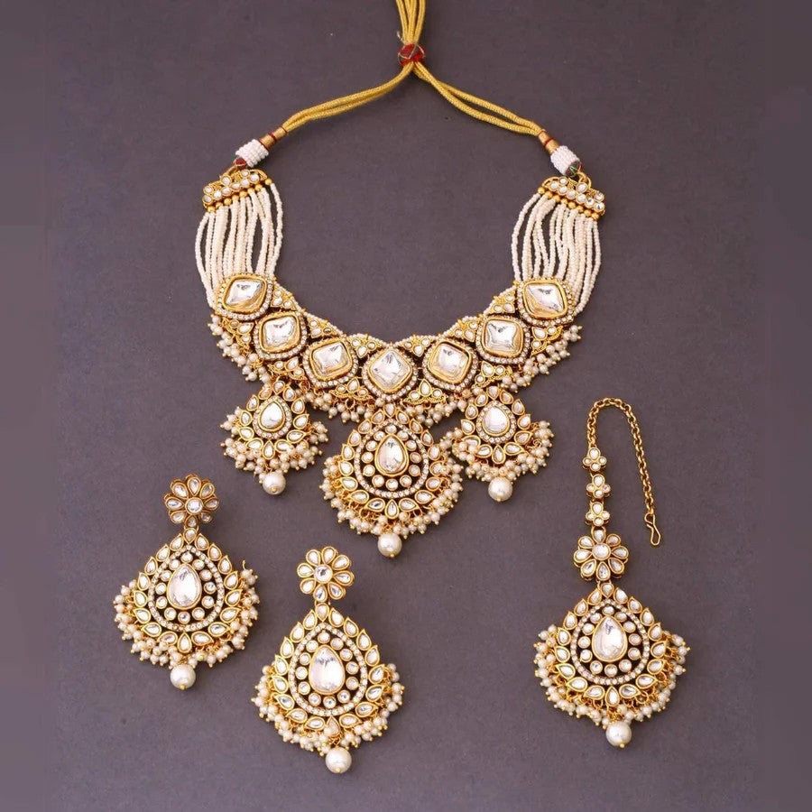 Taksh Creation Gold- plated kundan bridal jewellery set